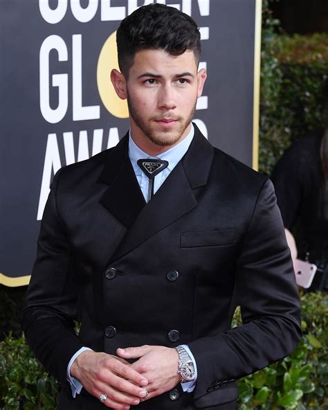 Nick Jonas Gives His Golden Globes Tux a Western Twist with a 